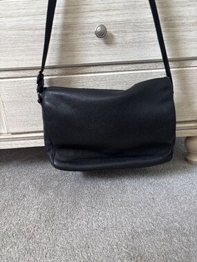 Coach black pebble messenger bag
